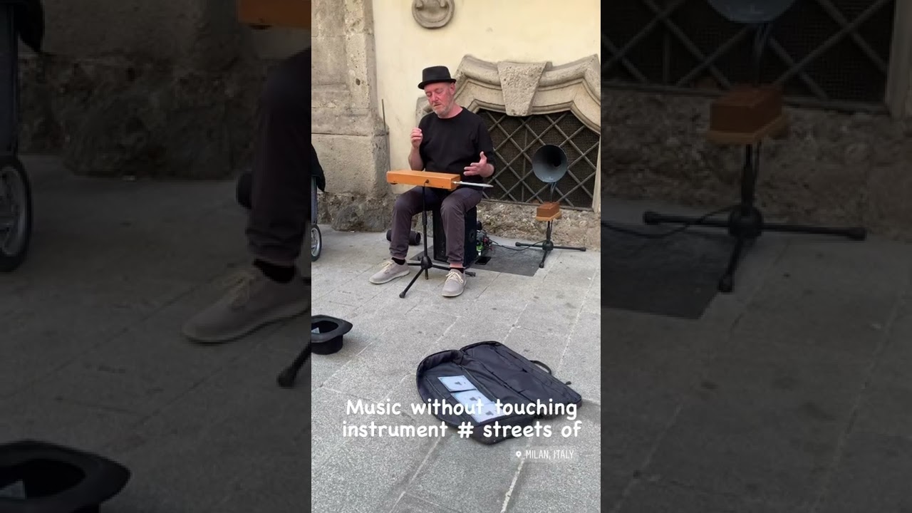 Music without touching instrument.Theremin.music in the air.streets of Italy.milan.extremely amazing