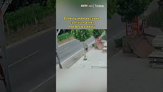 Elderly man escapes collision after hat blows away