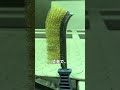 一本ずつ植え込むブラシ製造