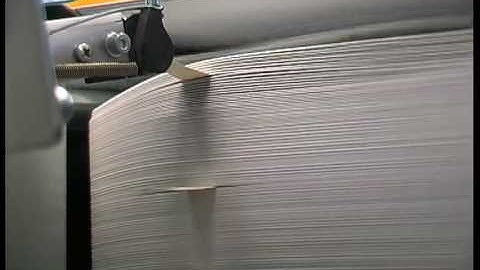 NCS/PROFESSIONAL tab-inserter on high speed sheeter - Insertadora de testigos NCS/A PROFESSIONAL