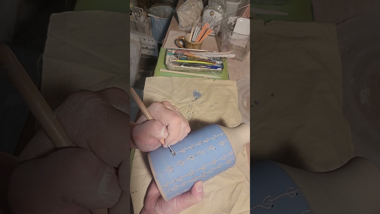 relaxing carving pottery- sgraffito doodle vine pattern on a modern farmhouse bottle/vase