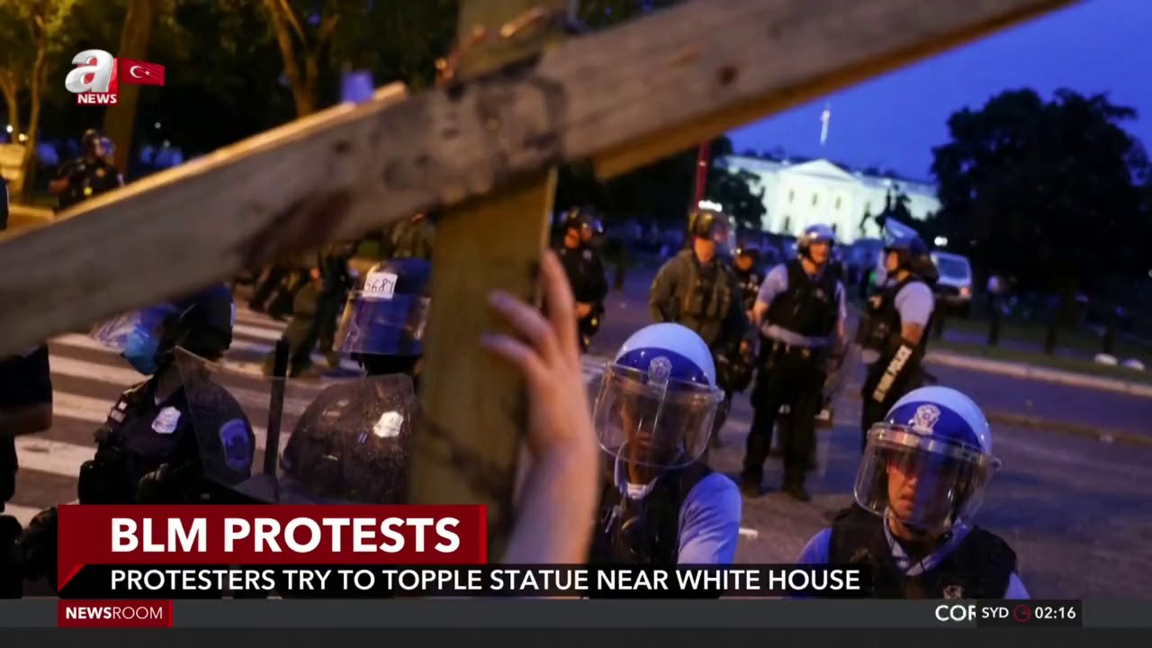 Anti-racism protesters try to topple statue of former U.S. president Andrew Jackson outside / A News