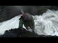 Big wave takes Steven under at Black Sand Beach in Iceland