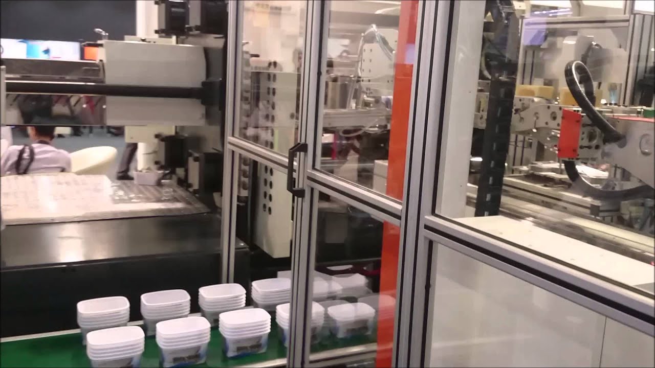 maquina inyección para caja plástica con sistema IML - YouTube
