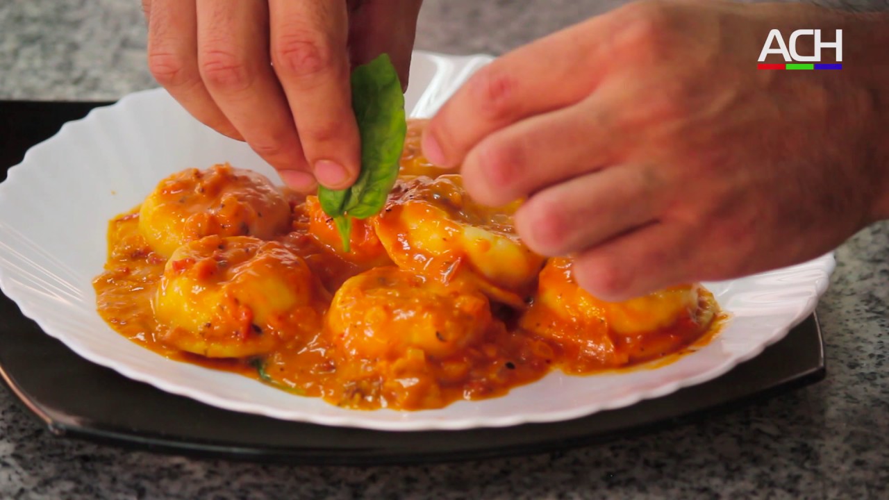 Gastronomía Sorrentinos caprese con salsa Aurora