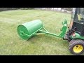 John deere x748  custom built lawn roller  rolling the lawn  20150502