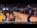 Stephen Curry hits a awkward spinning shot and gets the foul call