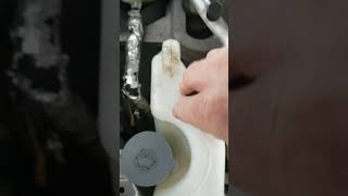 Checking coolant level on 2012 Nissan Altima 2.5
