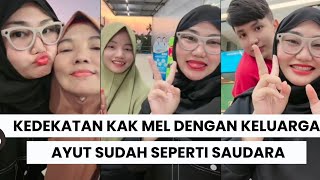 JIRAYUT AND KAK MELISSA ARE WALKING IN A THAILAND MALL ACCOMPANIED BY AYUT'S FAMILY