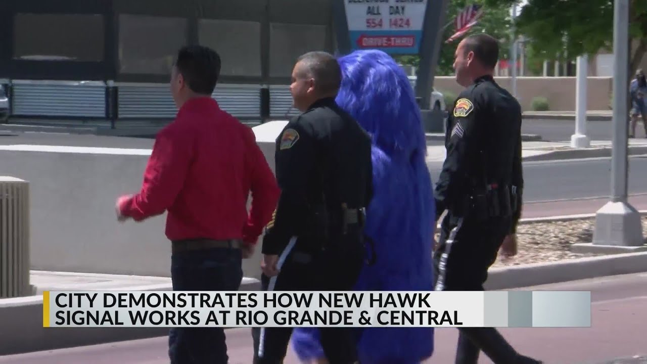 Albuquerque officials demonstrate new HAWK signal at Central and Rio Grande