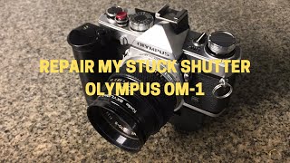 Repair Olympus Om1 stuck shutter release