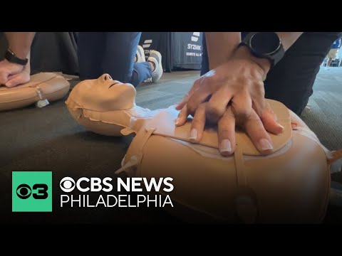 Football coaches gather in Lincoln Financial Field to learn CPR techniques