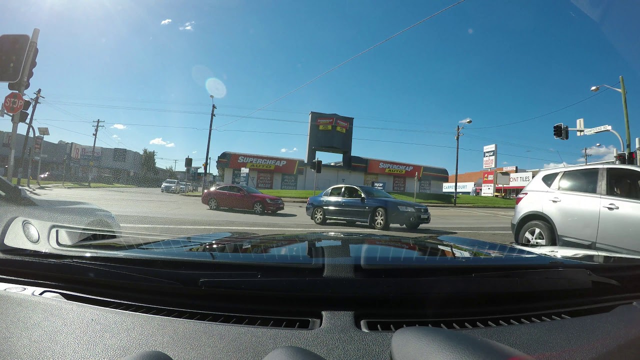 Idiot Driver - 2 arseholes through a red light Red Mercedes worst - YouTube