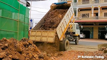 New Project, First Operator Skills Mini Dozer, Pushing the ground in front of the villagers