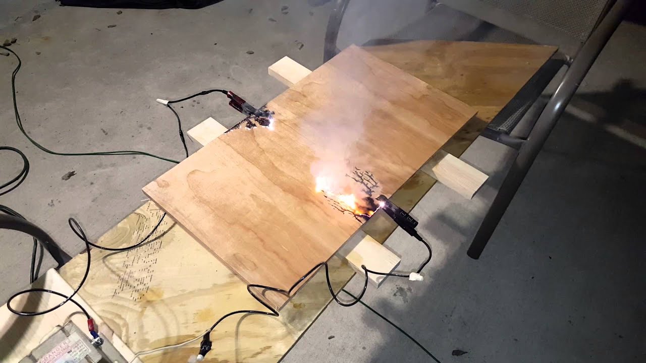 Using a Microwave Transformer to Burn Wood - YouTube