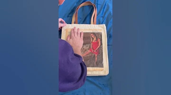 Transferring a magazine image to a blank tote bag with modge podge!
