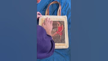 Transferring a magazine image to a blank tote bag with modge podge!
