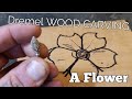 Power Wood carving a flower with  a dremel and kutzall carving bur.