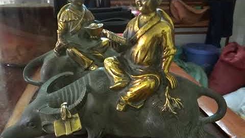 cặp trâu đồng phong thủy - tiên đồng ngọc nữ cởi trâu - cặp trâu đồng cổ - đồ đồng cổ