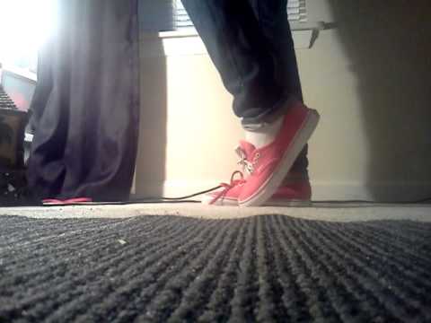 pink vans on feet