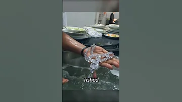 Woman fishing out diamond necklace while washing dishes. #shorts