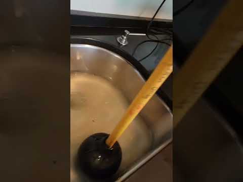 How to unclog a sink with a plunger #shorts