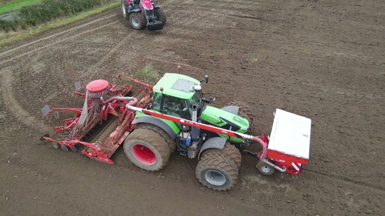 Deutz Fahr 7250 TTV Warrior fitted with a Kuhn TF1512 5metre one pass sower.