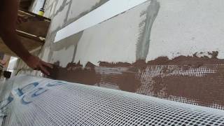 Выведение сетки в месте примыкания фасадного пенопласта к рольставням