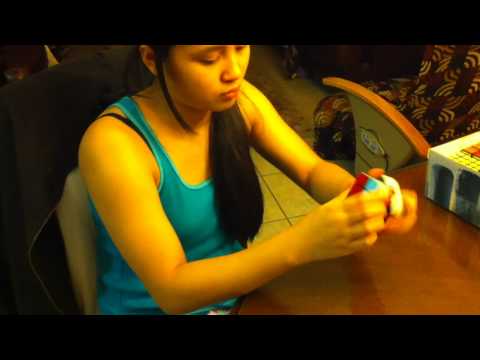 Caye Caparas Solving Rubik's Cube by: John Caparas