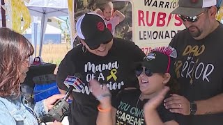 8-year-old cancer survivor hosts lemonade stand to celebrate birthday
