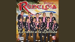 Video thumbnail of "Banda Rebeldía - Ojos Negros Nunca Enganan"