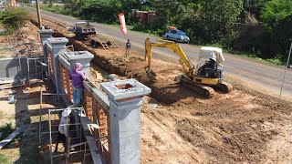 Perfect first New project! komatsu 50 Excavator is pouring soil clearing sewers making a Road