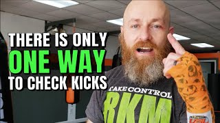 The Correct Way to Check Leg Kicks in Muay Thai, MMA and Kickboxing | Foot Up or Down?