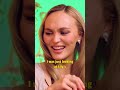 Who made the better gingerbread house: Nicholas Hoult or Lily-Rose Depp?! 🤔🍪🎄