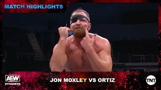 Jon Moxley hits Ortiz & Santana with Paradigm Shifts to the roar of the AEW crowd