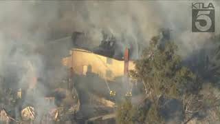 Brush fire burns 2 acres in Whittier; at least 2 home engulfed in flames