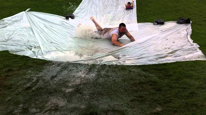 Coach Scott Whiteman Going Down The Water Slide