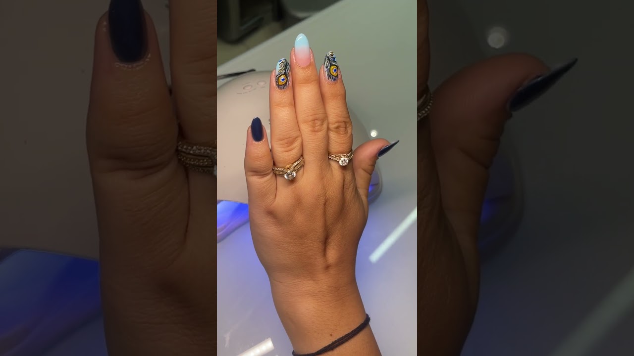 Peacock-Inspired Nail Art: Bold Colors and Elegant Designs 