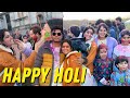 Happy holi  indians celebrating holi in uk 