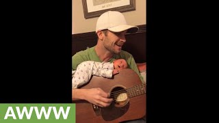 Dad serenades newborn baby to sleep on guitar