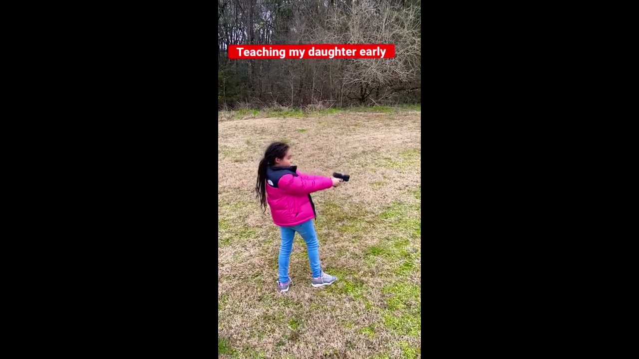 My Daughter Shooting Her First Gun G2C 