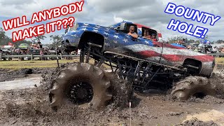 Mega Monster Trucks VS A BOTTOMLESS Mud Pit!!!  Full Ironhorse Bounty Hole Competition!!