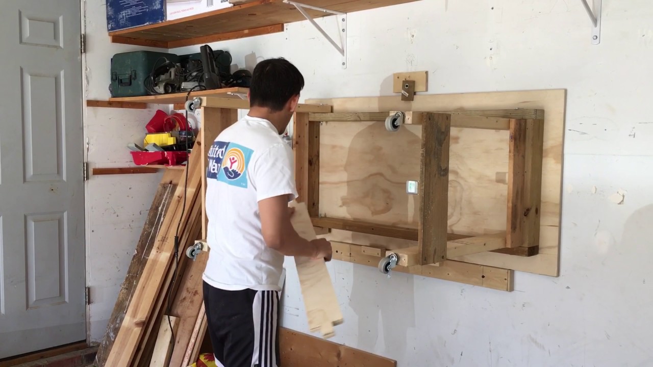 Wall mounted rolling work bench part 1. - YouTube