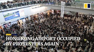 Read more here: http://sc.mp/z0oc subscribe to our channel for free
https://sc.mp/subscribe- passengers at hong kong international
airpo...