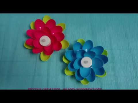 Fiore portacandela con cucchiai di plastica