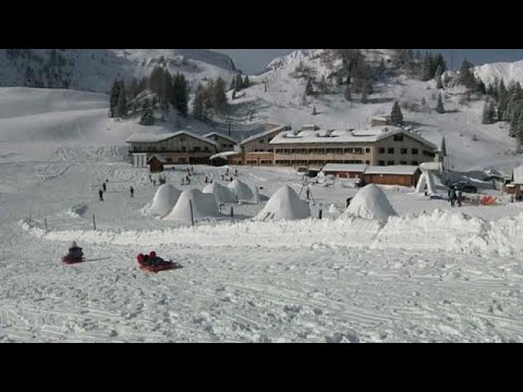 Igloo village built by migrants hands lifeline to dying Italian ski resort