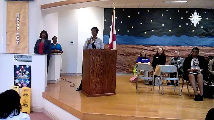 Tiffany McCord speaks to young girls at Bellingrat...