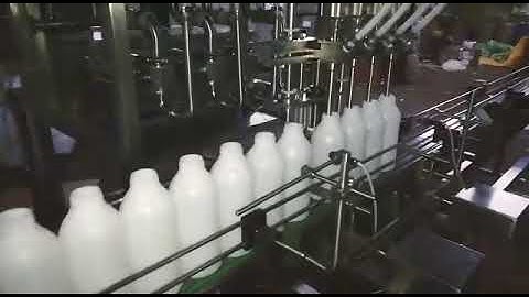 SWANPACK PESTICIDES BOTTLE FILLING MACHINE