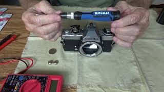 fix stuck battery cover on your film camera