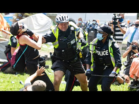 Toronto police use brute force to dismantle homeless encampment